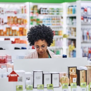 female customer shopping in drug store