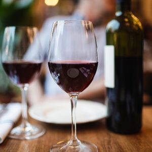 wine glasses on dinner table