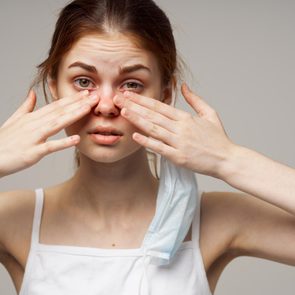 woman rub eye