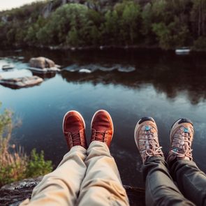 boots overlooking Mountain View lake love couple hiking mental health