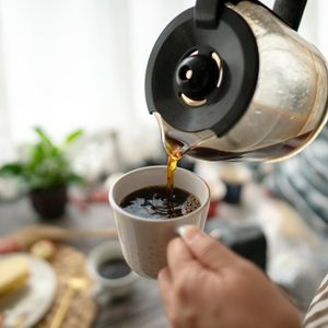 pouring coffee at breakfast